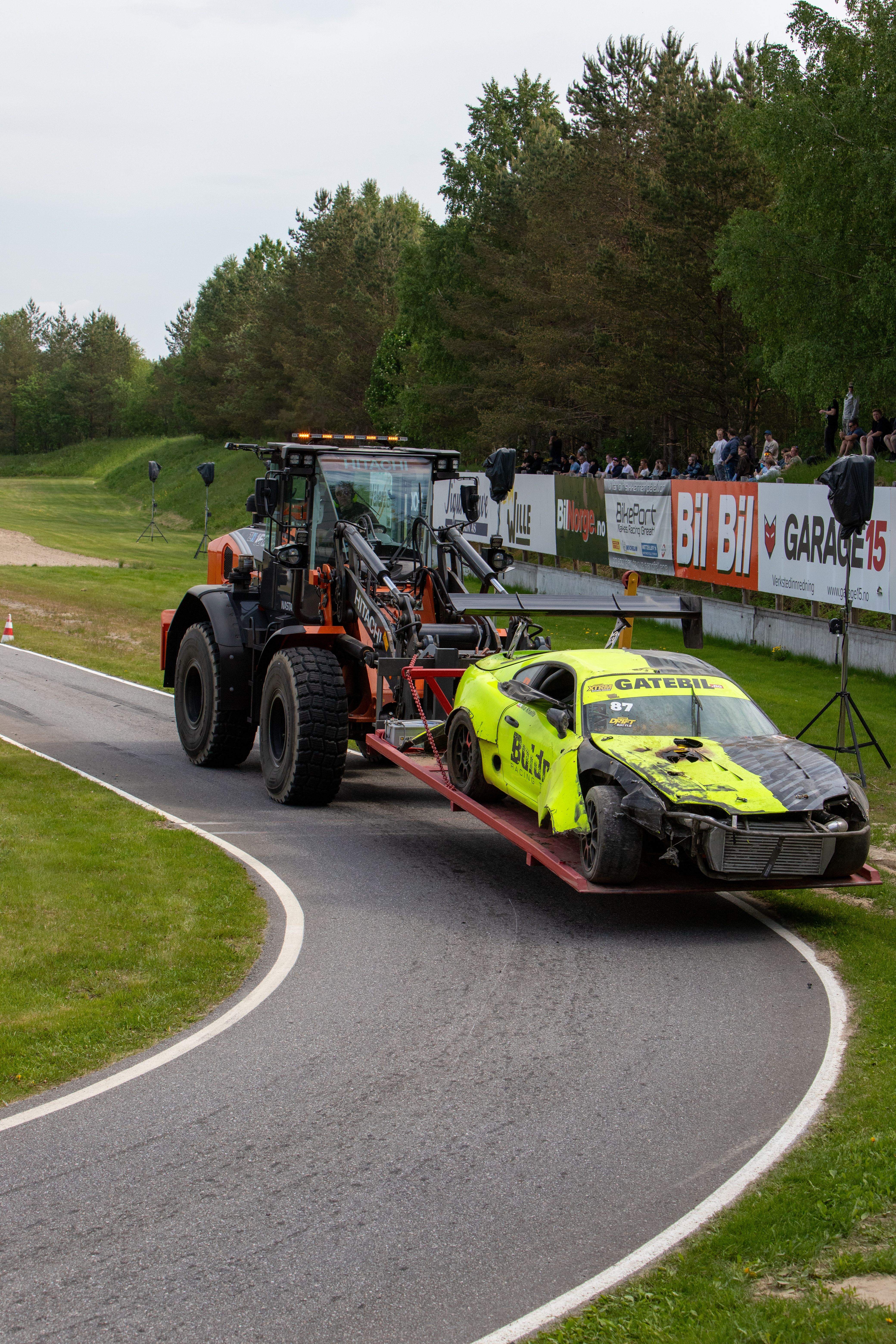Heavy equipment transport on flatbed truck